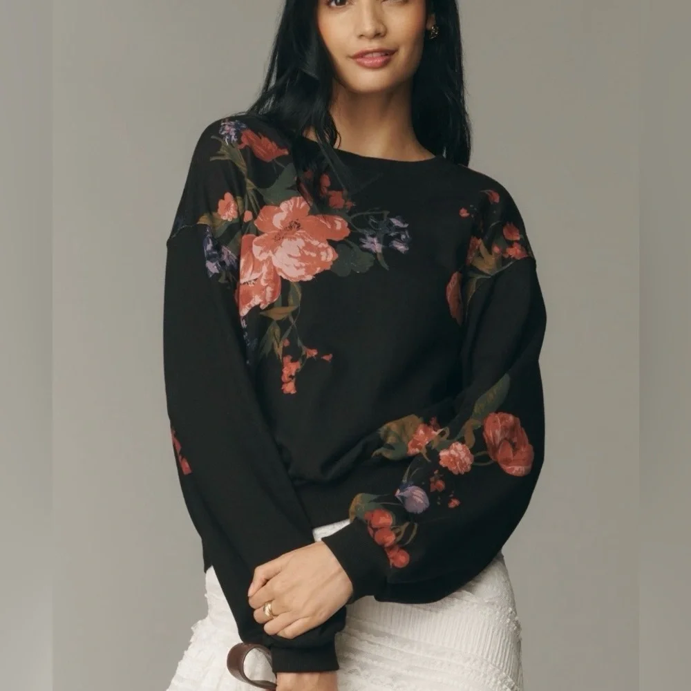 Anthropologie’s Niki Black Floral Sweatshirt from Pilcro - Picture 1 of 5